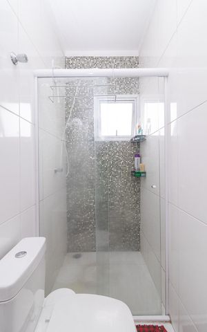 Casa de condomínio à venda com 60m², 2 quartos e 2 vagasBanheiro da Suíte 1