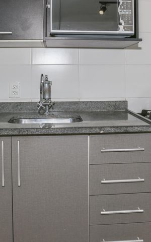 Apartamento à venda com 32m², 1 quarto e sem vaga Apartamento à venda com 32m², 1 quarto e sem vagaCozinha e Área de Serviço