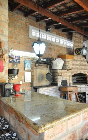 Casa à venda com 420m², 5 quartos e 4 vagasChurrasqueira