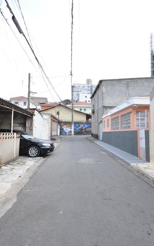 Casa à venda com 420m², 5 quartos e 4 vagasAspecto geral da rua