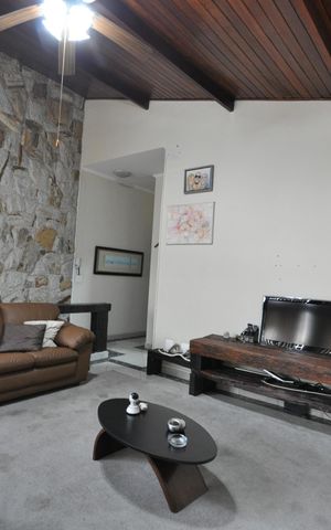 Casa à venda com 420m², 5 quartos e 4 vagasSala e TV