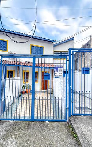 Casa para alugar com 70m², 2 quartos e 1 vagaFachada com Plaquinha