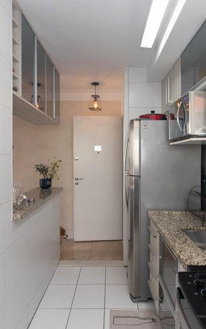 Apartamento à venda com 61m², 2 quartos e 1 vaga Apartamento à venda com 61m², 2 quartos e 1 vagaCozinha e Área de Serviço