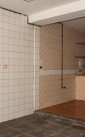 Casa à venda com 400m², 3 quartos e 3 vagasCozinha externa (Piso inferior)