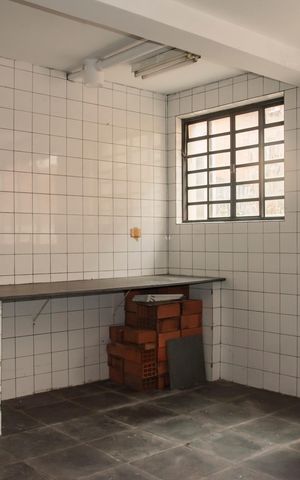 Casa à venda com 400m², 3 quartos e 3 vagasCozinha externa (Piso inferior)