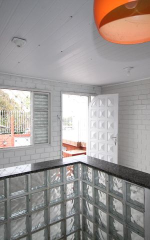 Casa à venda com 52m², 2 quartos e 2 vagasSala/Cozinha