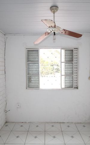 Casa à venda com 52m², 2 quartos e 2 vagasQuarto 1