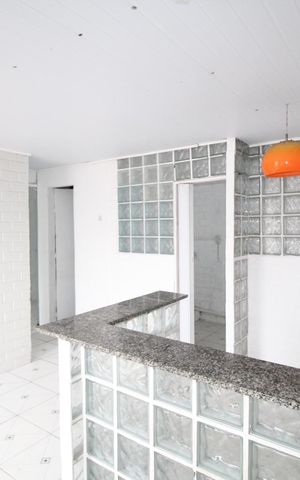 Casa à venda com 52m², 2 quartos e 2 vagasSala/Cozinha