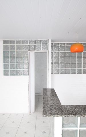 Casa à venda com 52m², 2 quartos e 2 vagasSala/Cozinha