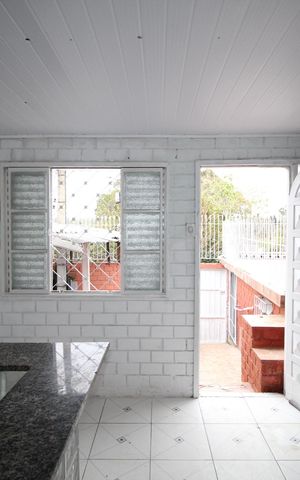 Casa à venda com 52m², 2 quartos e 2 vagasSala/Cozinha