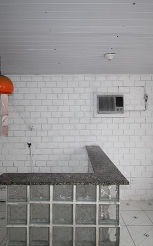 Casa à venda com 52m², 2 quartos e 2 vagasSala/Cozinha