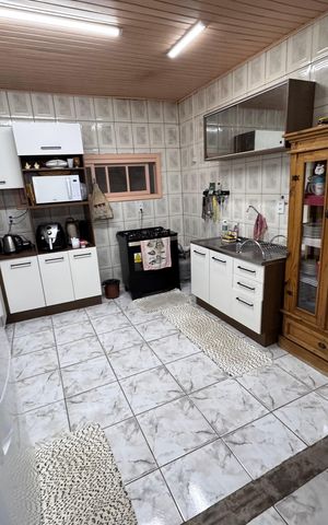 Casa à venda com 166m², 3 quartos e 2 vagas Casa à venda com 166m², 3 quartos e 2 vagasCozinha