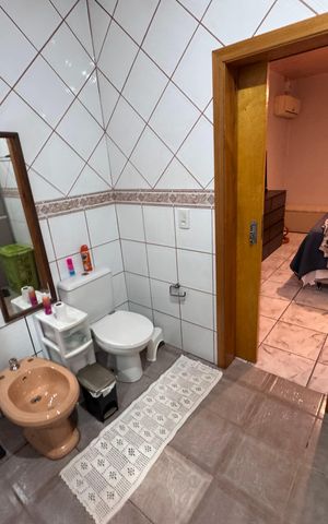 Casa à venda com 166m², 3 quartos e 2 vagas Casa à venda com 166m², 3 quartos e 2 vagasBanheiro Suíte