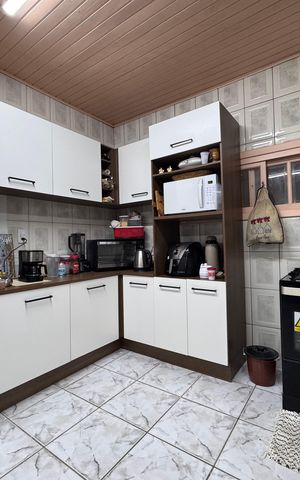Casa à venda com 166m², 3 quartos e 2 vagas Casa à venda com 166m², 3 quartos e 2 vagasCozinha
