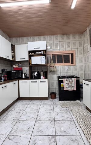 Casa à venda com 166m², 3 quartos e 2 vagas Casa à venda com 166m², 3 quartos e 2 vagasCozinha