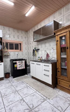 Casa à venda com 166m², 3 quartos e 2 vagas Casa à venda com 166m², 3 quartos e 2 vagasCozinha