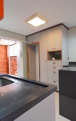Casa de condomínio para alugar com 140m², 3 quartos e 2 vagasCozinha 