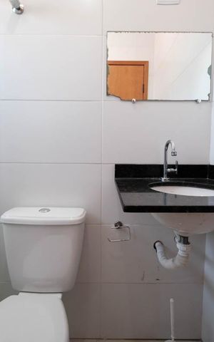 Casa de condomínio à venda com 83m², 2 quartos e 2 vagasBanheiro da Suíte 1