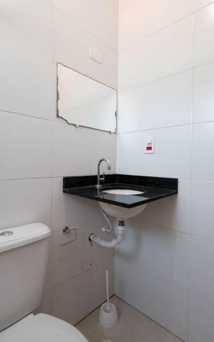 Casa de condomínio à venda com 83m², 2 quartos e 2 vagasBanheiro da Suíte 1