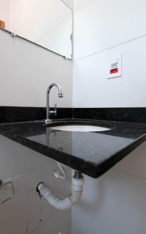 Casa de condomínio à venda com 83m², 2 quartos e 2 vagasBanheiro da Suíte 1