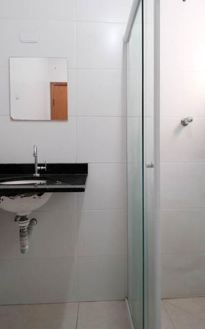 Casa de condomínio à venda com 83m², 2 quartos e 2 vagasBanheiro da Suíte 2
