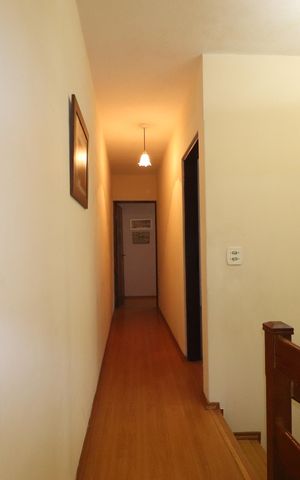 Casa à venda com 182m², 3 quartos e 2 vagasCorredor Quartos