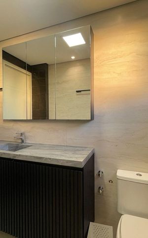 Apartamento à venda com 65m², 1 quarto e 2 vagasBanheiro social