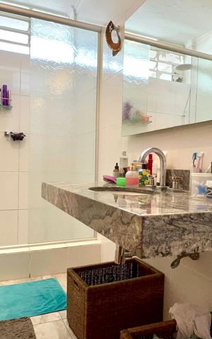 Casa à venda com 400m², 4 quartos e 2 vagas Casa à venda com 400m², 4 quartos e 2 vagasBanheiro da Suíte