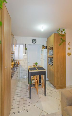 Casa de condomínio à venda com 42m², 2 quartos e 1 vaga Casa de condomínio à venda com 42m², 2 quartos e 1 vagaSala/Cozinha