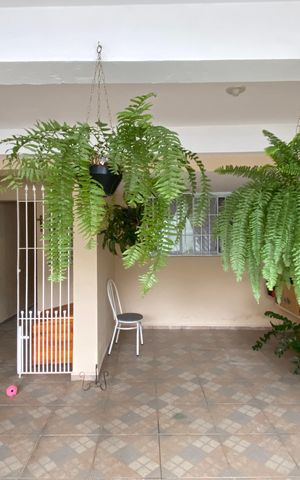 Casa à venda com 125m², 4 quartos e 2 vagas Casa à venda com 125m², 4 quartos e 2 vagasGaragem