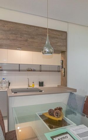 Apartamento à venda com 100m², 3 quartos e 1 vaga Apartamento à venda com 100m², 3 quartos e 1 vagaCozinha e Área de Serviço