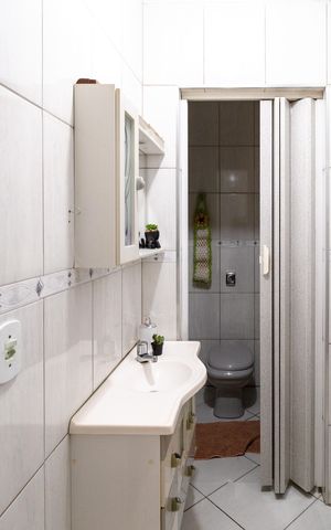 Casa à venda com 129m², 3 quartos e 2 vagasLavabo