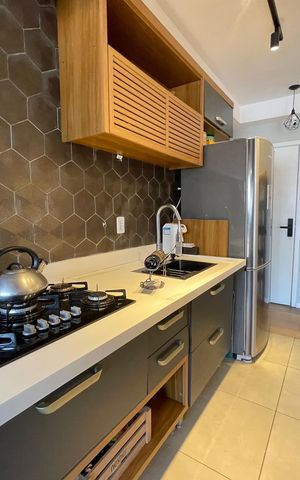 Apartamento à venda com 77m², 1 quarto e 1 vaga Apartamento à venda com 77m², 1 quarto e 1 vagaCozinha e Área de Serviço