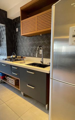 Apartamento à venda com 77m², 1 quarto e 1 vaga Apartamento à venda com 77m², 1 quarto e 1 vagaCozinha e Área de Serviço