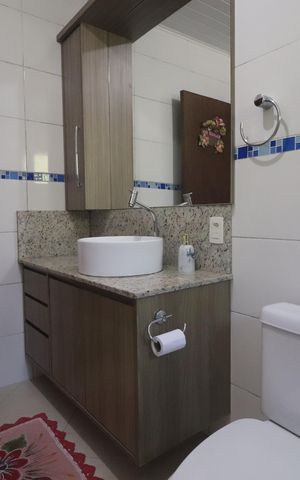 Casa à venda com 140m², 3 quartos e 2 vagasBanheiro