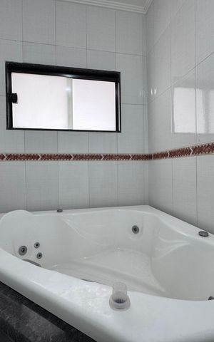 Casa de condomínio à venda com 350m², 4 quartos e 1 vaga Casa de condomínio à venda com 350m², 4 quartos e 1 vagaSuíte 1 - Banheiro