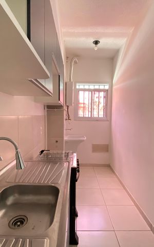 Apartamento à venda com 48m², 2 quartos e sem vaga Apartamento à venda com 48m², 2 quartos e sem vagaCozinha e Área de Serviço