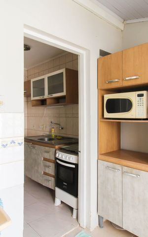 Casa de condomínio à venda com 88m², 2 quartos e 1 vaga Casa de condomínio à venda com 88m², 2 quartos e 1 vagaCozinha e Área de Serviço