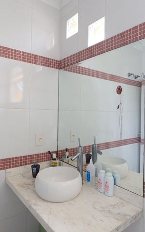 Casa à venda com 660m², 3 quartos e 6 vagasBanheiro da Suíte 2