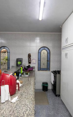 Casa à venda com 400m², 4 quartos e 6 vagas Casa à venda com 400m², 4 quartos e 6 vagasCozinha