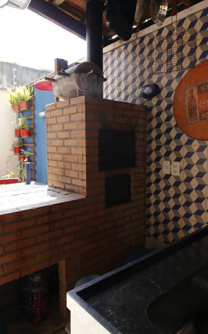 Casa de condomínio à venda com 140m², 4 quartos e 2 vagasQuintal