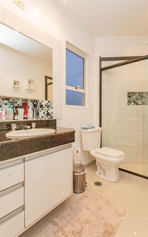 Casa à venda com 150m², 3 quartos e 3 vagasBanheiro da Suíte 1