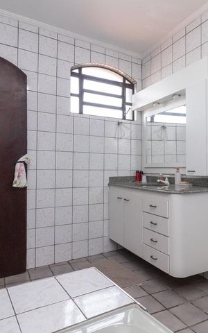 Casa à venda com 330m², 4 quartos e 5 vagasBanheiro da Suíte 3