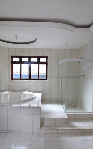 Casa à venda com 412m², 5 quartos e 3 vagasBanheiro da Suíte