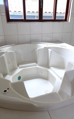 Casa à venda com 412m², 5 quartos e 3 vagasBanheiro da Suíte