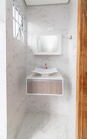 Casa à venda com 204m², 3 quartos e 2 vagasBanheiro da Suíte