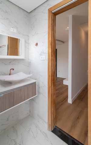 Casa à venda com 204m², 3 quartos e 2 vagasBanheiro da Suíte
