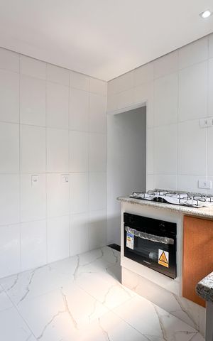 Casa à venda com 110m², 3 quartos e 1 vaga Casa à venda com 110m², 3 quartos e 1 vagaCozinha