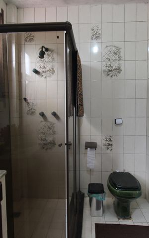 Casa à venda com 1200m², 4 quartos e 3 vagasBanheiro da suíte