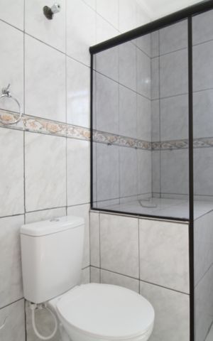 Casa para alugar com 135m², 3 quartos e 2 vagasBanheiro da Suíte 1